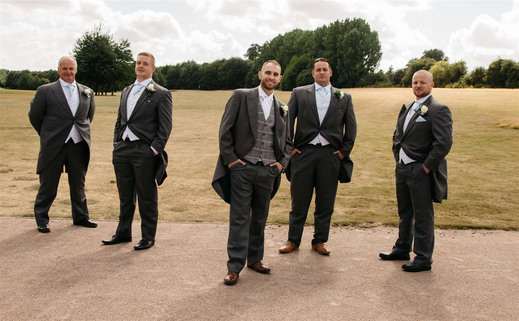 The men looking dapper in their grey tailed suit from Jodi's of Maidstone, From left, Steve Nickalls, Jack Nickalls, groom Stan Hunt, Mike Harwood and Chris Nickalls