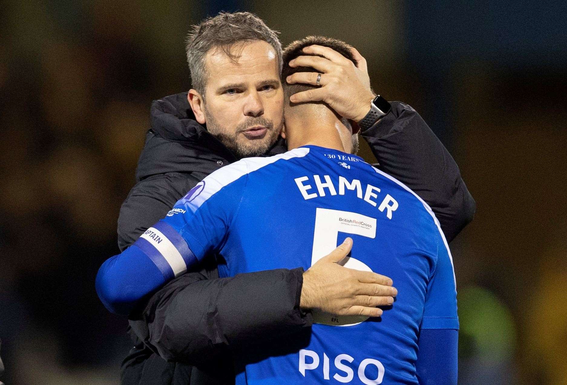 Head coach Stephen Clemence congratulates Max Ehmer after a 1-0 win for Gillingham over Sutton Picture: @Julian_KPI