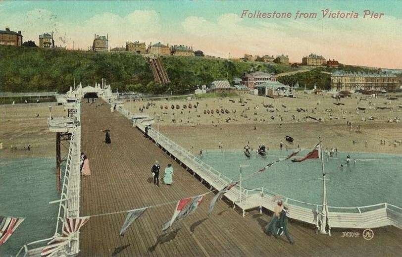 Looking back inland - a postcard from the time shows what the view from the pier would have been like in Folkestone