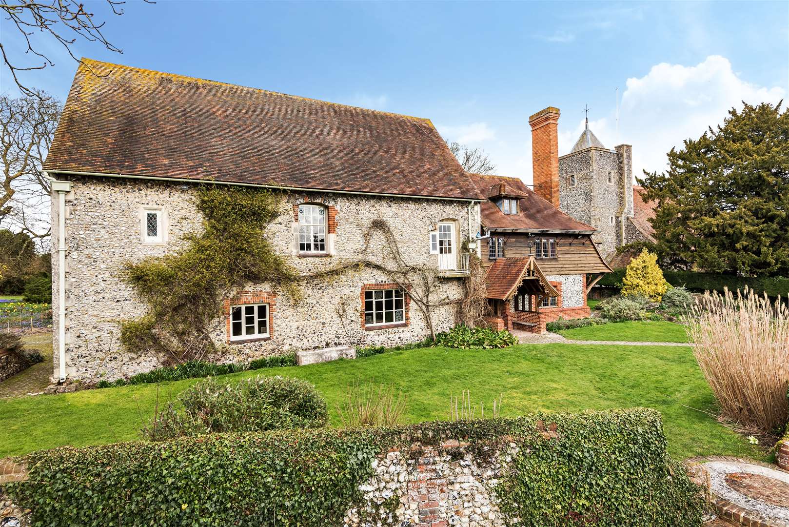 The flint and stone built home also has spectacular, far reaching views across the Kentish countryside. Photo Savills.