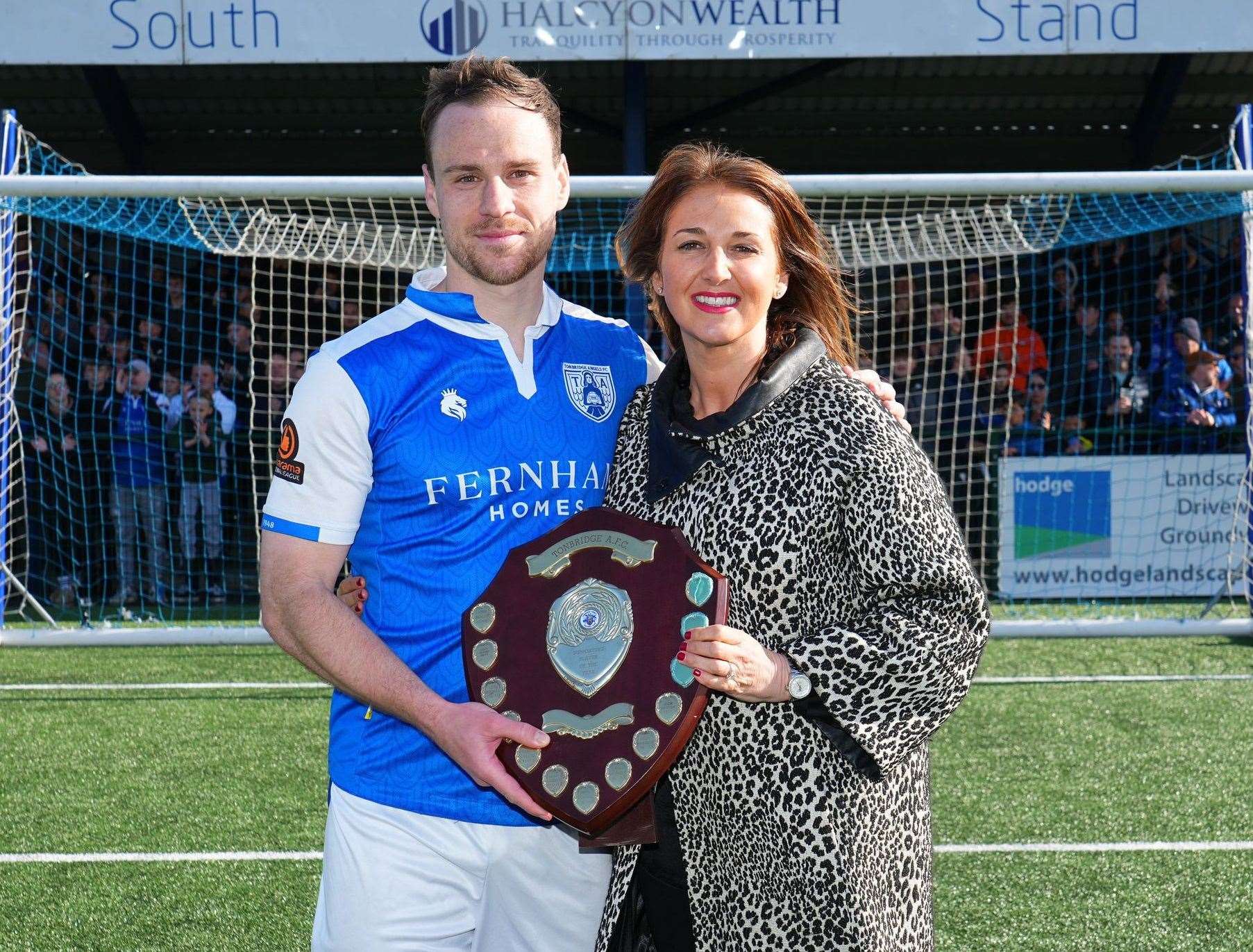 Tonbridge Angels player-of-the-year Jordan Higgs with chair Sophie Purves. Picture: David Couldridge