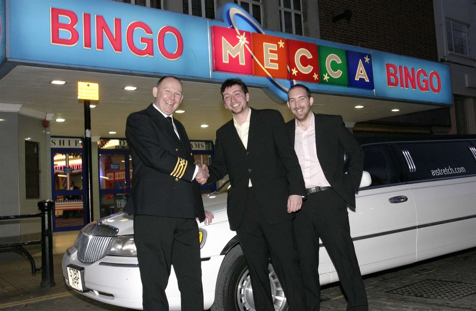 Competition winner Rod Dale and friend John Reeve arrive at the bingo hall in a limo in 2005