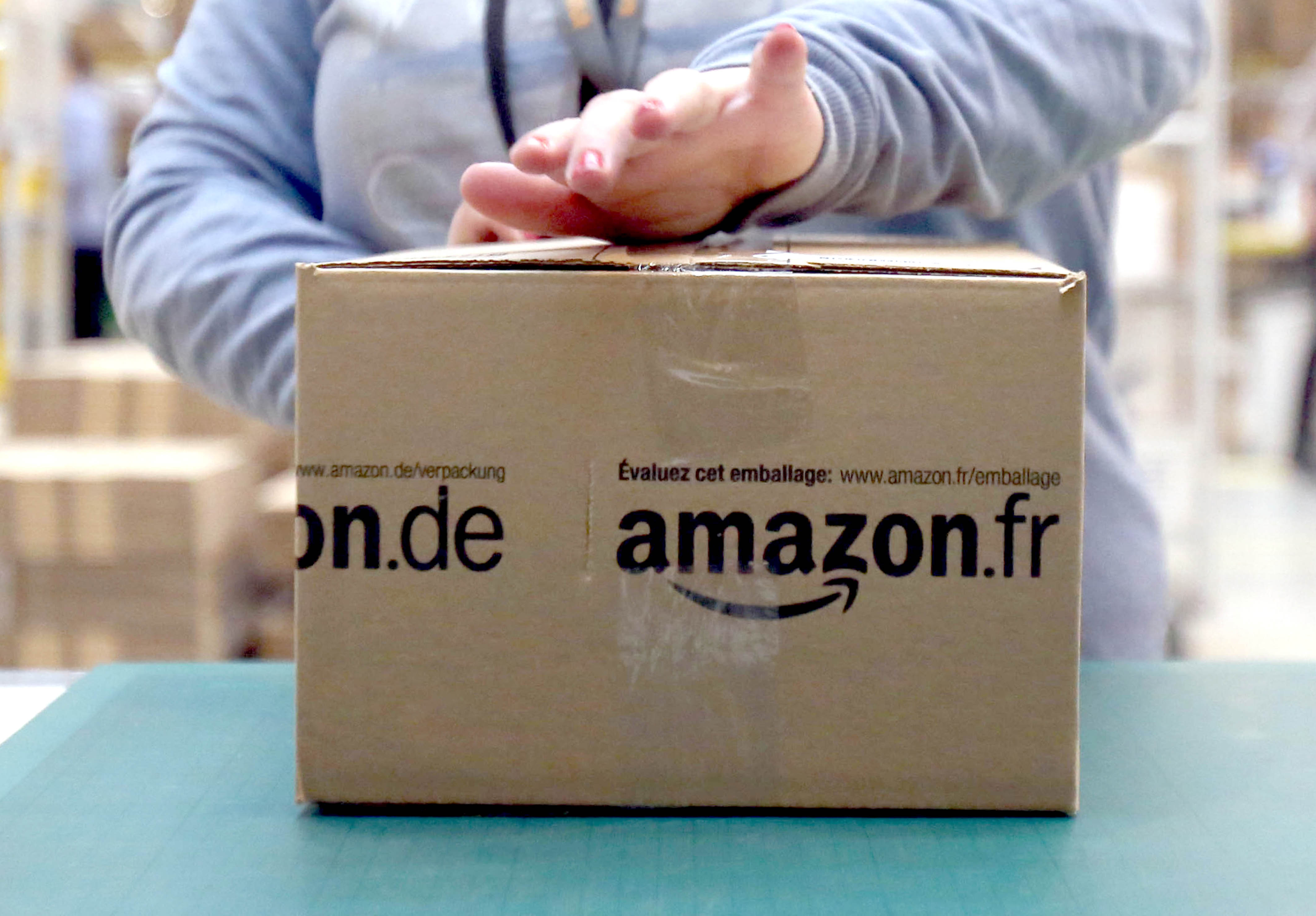 Amazon gives staff £2anhour pay rise as customers keep shopping