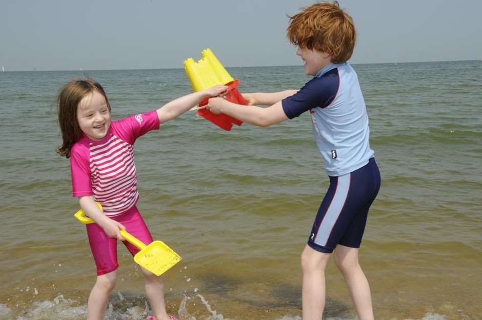 Ben and Ivy Trayner-Clarke in the sea at Whitstable