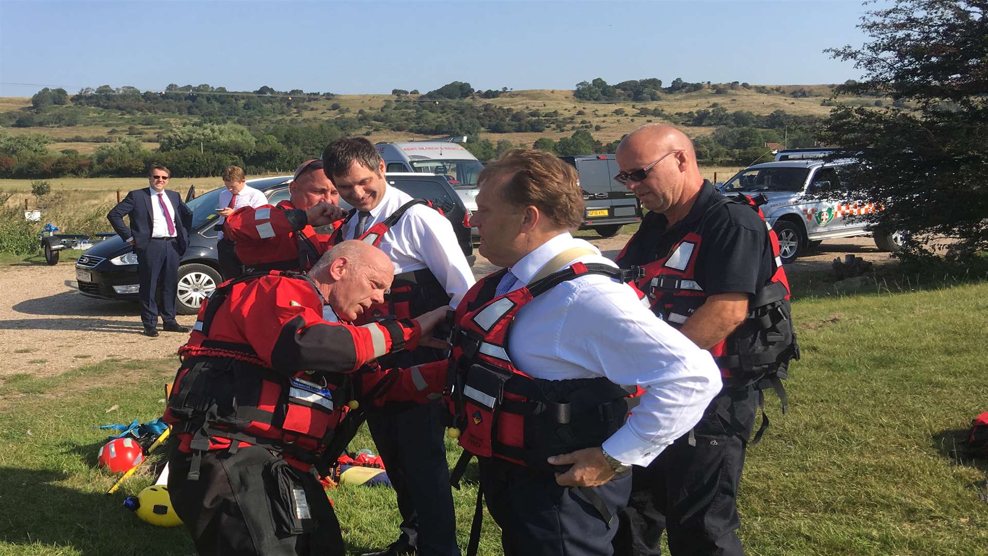 MP John Hayes gets measured up for his lifejacket. Picture: Department for Transport