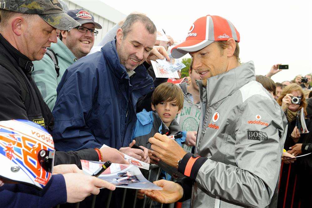 Jenson Button signs autographs at a previous visit to Brands Hatch