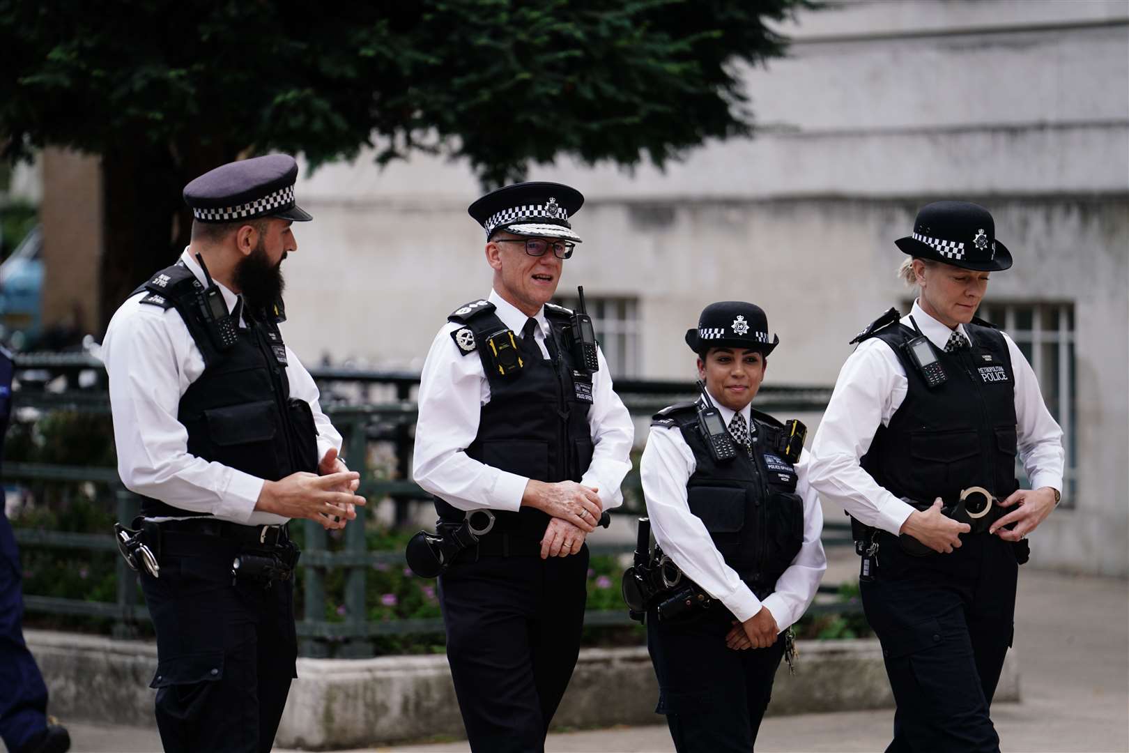 Sir Mark Rowley (second left) in Hackney, east London, to publicise his force’s new Pc recruitment ad campaign (Jordan Pettitt/PA)