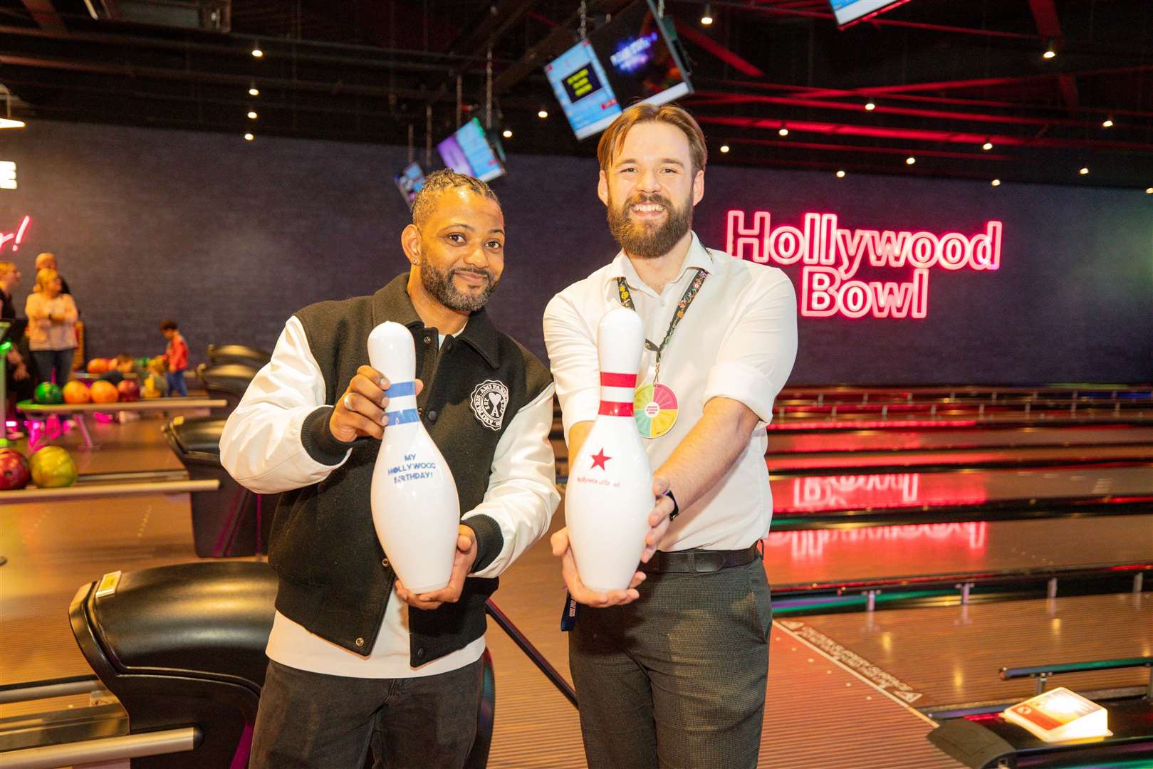 JB with centre manager Alex Poole at the new bowling alley. Picture: Hollywood Bowl