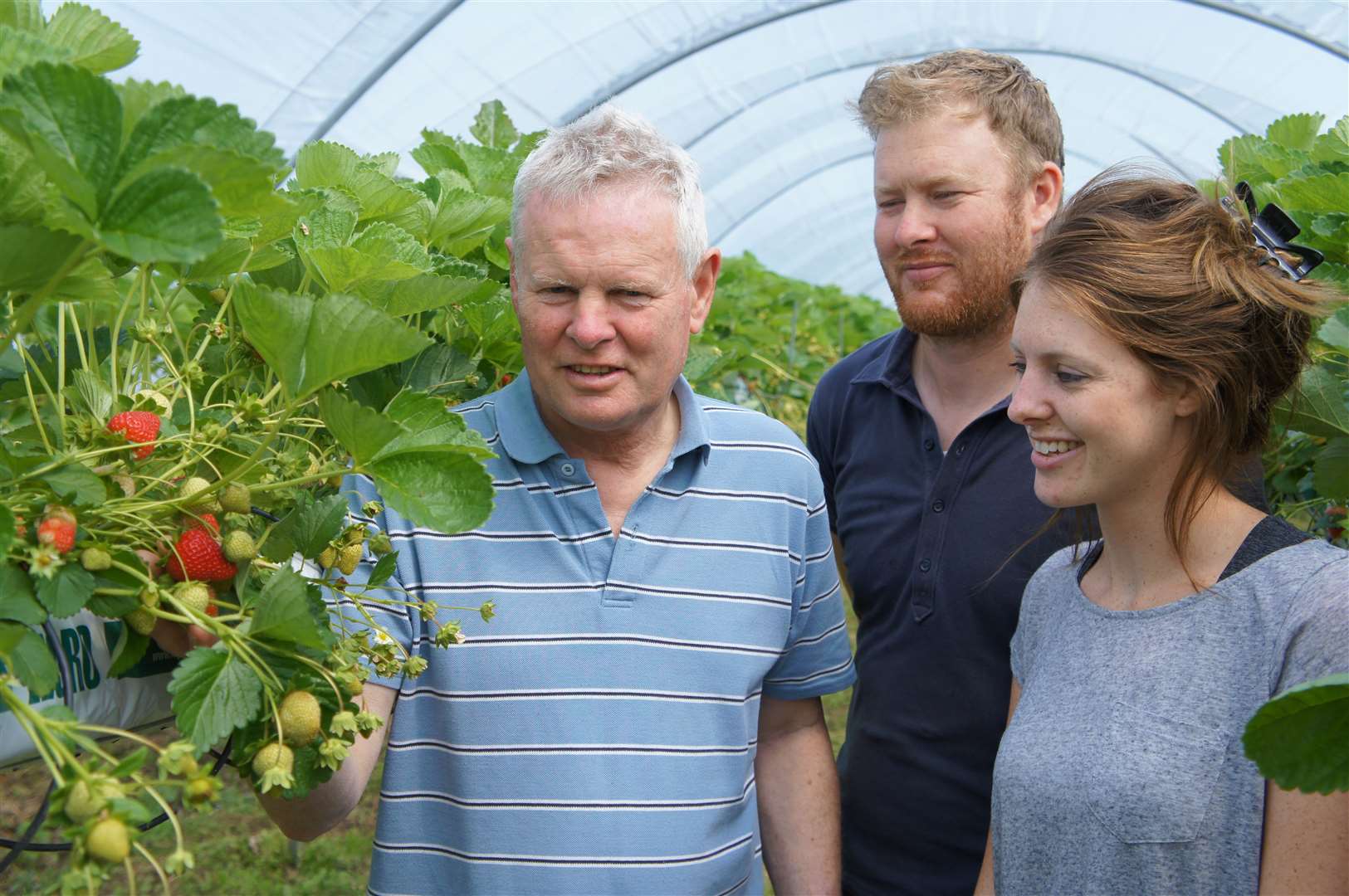 David, Ben and Charlotte on the farm