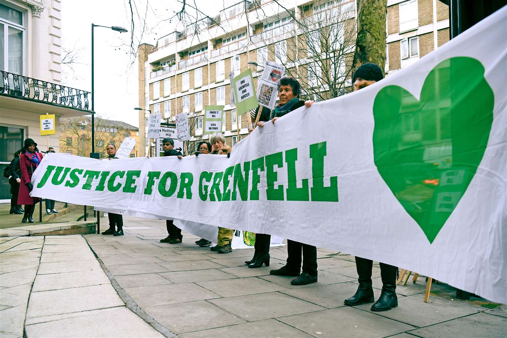 Protesters outside the Grenfell Tower public inquiry in London, which began in January 2020 (Kirsty O’Connor/PA)