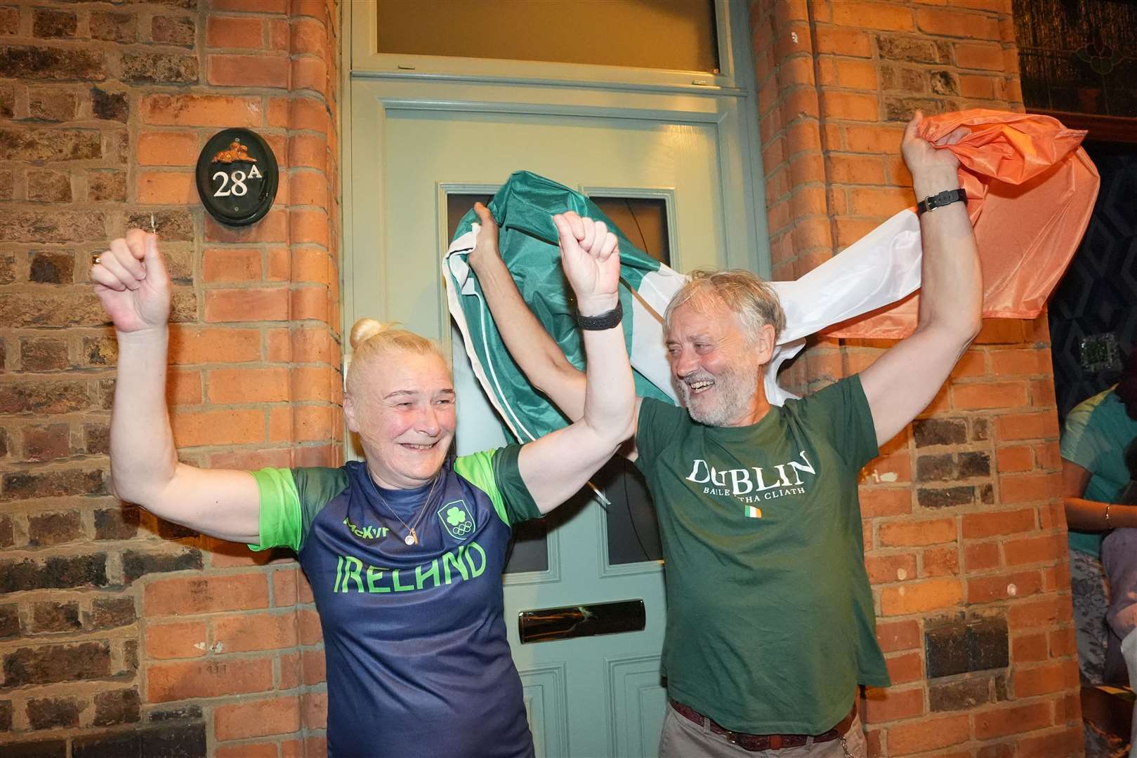 Kellie Harrington’s parents Yvonne and Christy Harrington celebrate in Dublin, as Kellie was crowned Olympic champion after beating Wenlu Yang at Roland Garros in the women’s 60kg final, during the Paris 2024 Olympic Games (PA)