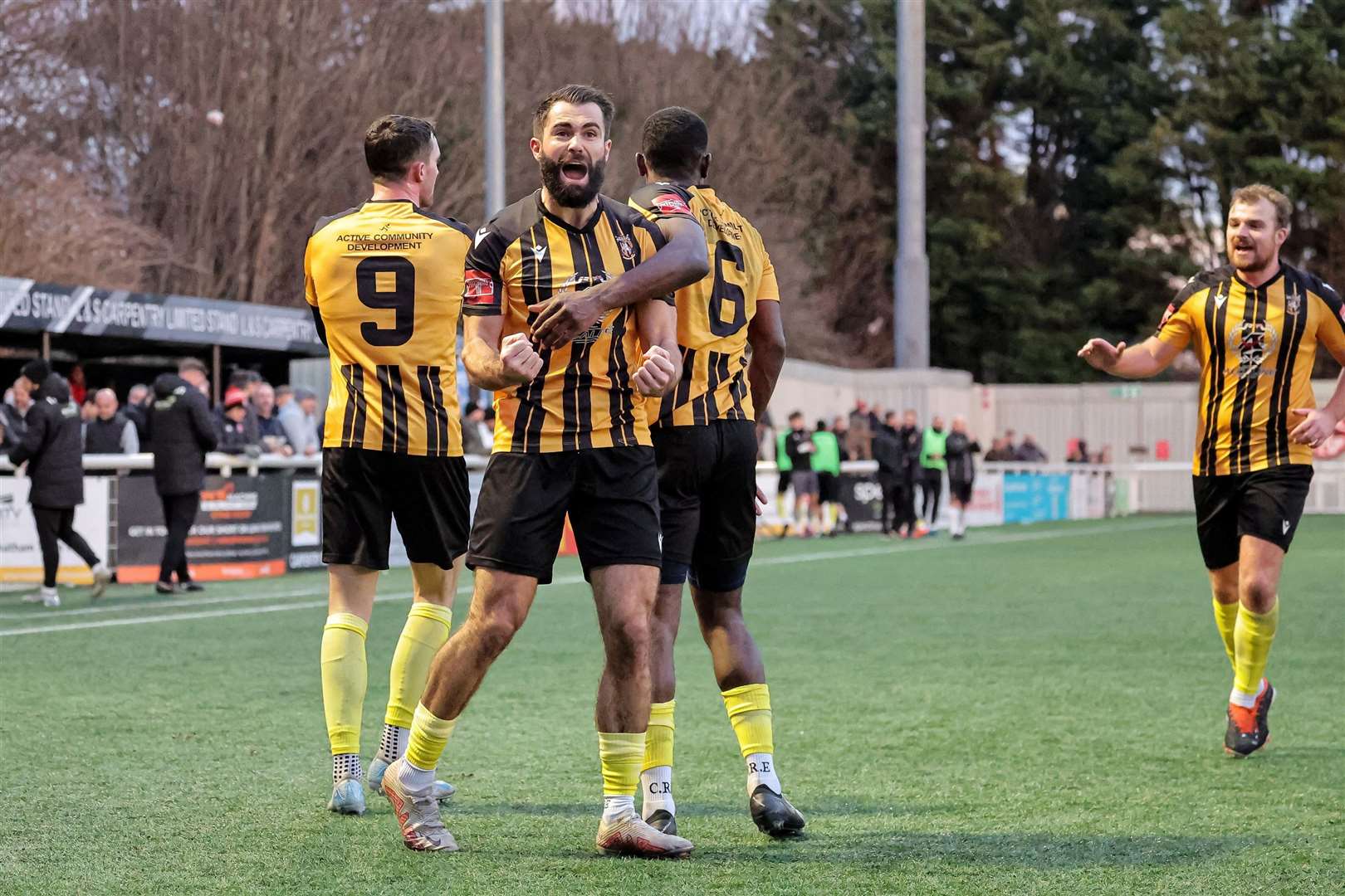 Joe Turner celebrates his equaliser for Folkestone. Picture: Helen Cooper