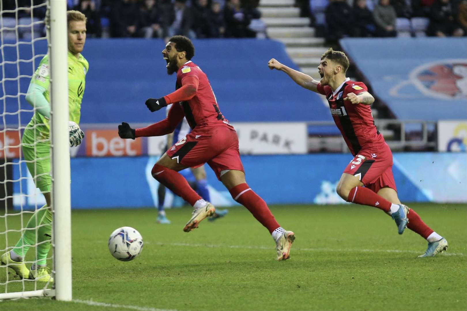 Gillingham celebrate getting back into the game at Wigan Athletic Picture: KPI