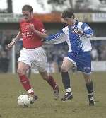 ON THE RUN: The impressive Andy Drury gets away from Bishop's Stortford's Gareth Gwillim. Picture: MATT READING