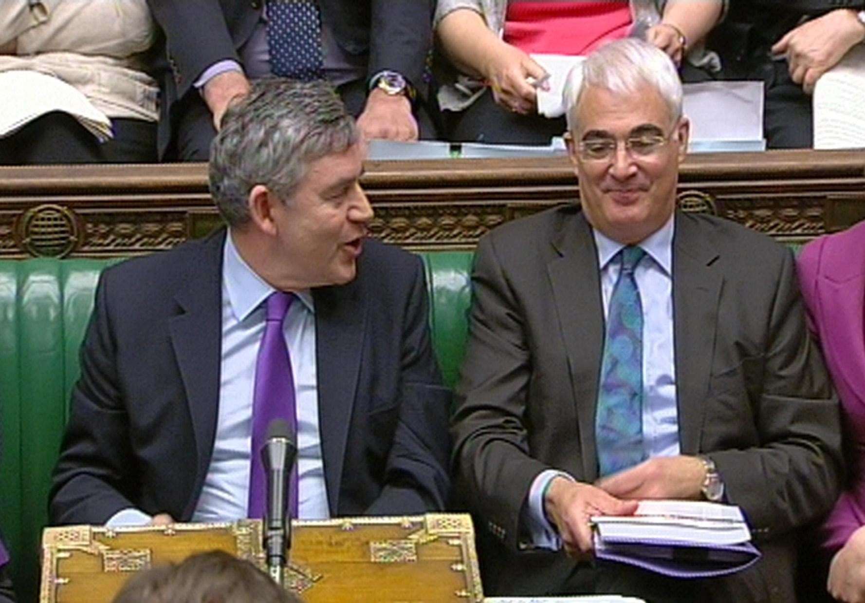 Alistair Darling and Gordon Brown during Prime Minister’s Questions (PA)