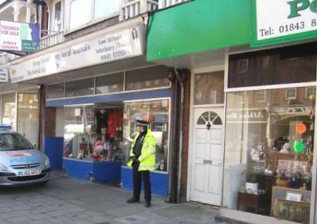 Police outside the property where the body was found. Picture: MIKE PETT