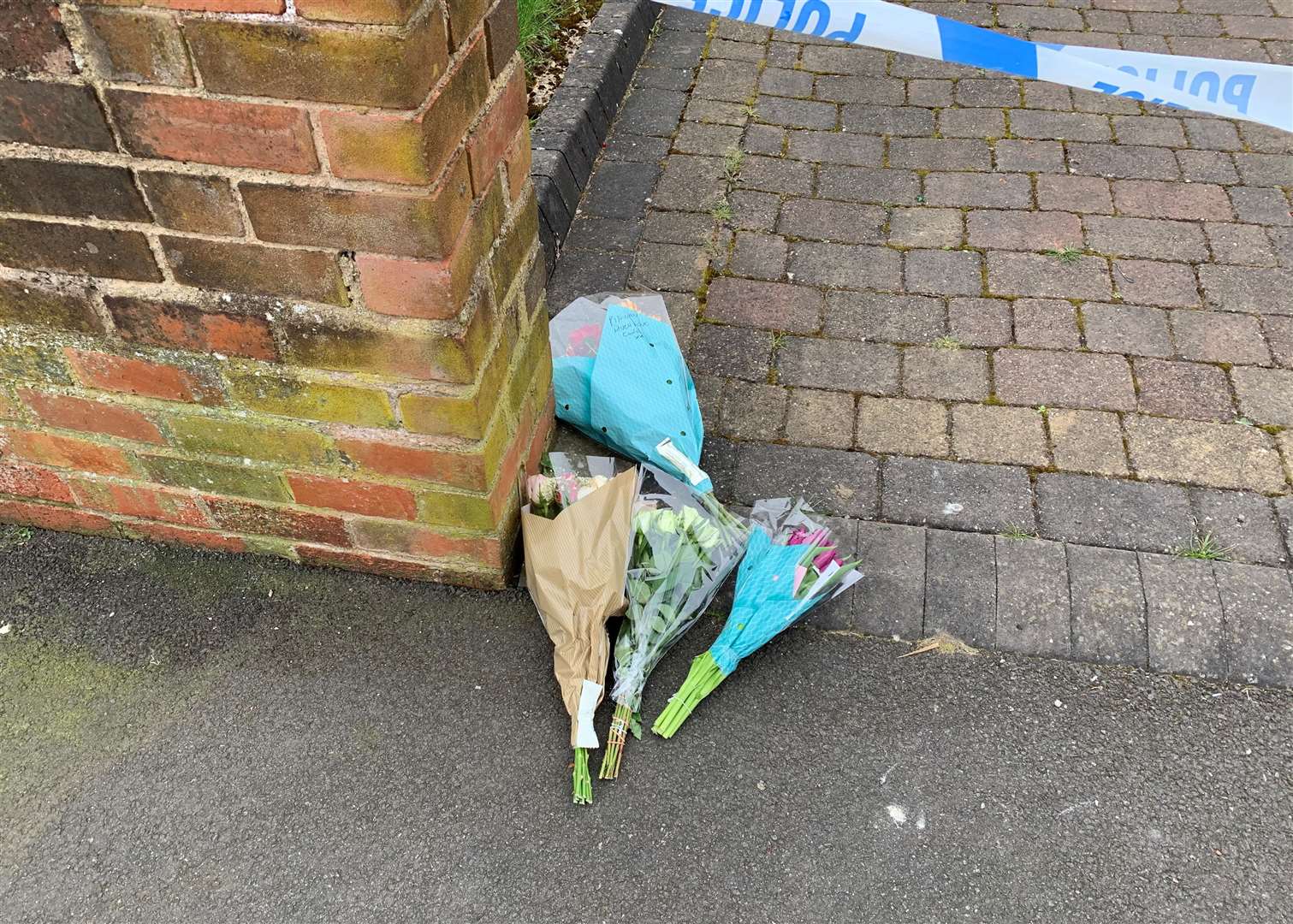 Flowers outside the house on Boundary Avenue in Rowley Regis (Josh Payne/PA)