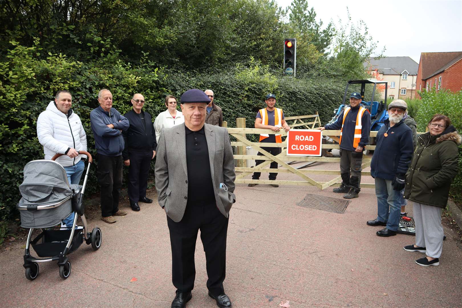 Cllr James Hall and residents at the entrance to the bus lane at Murston