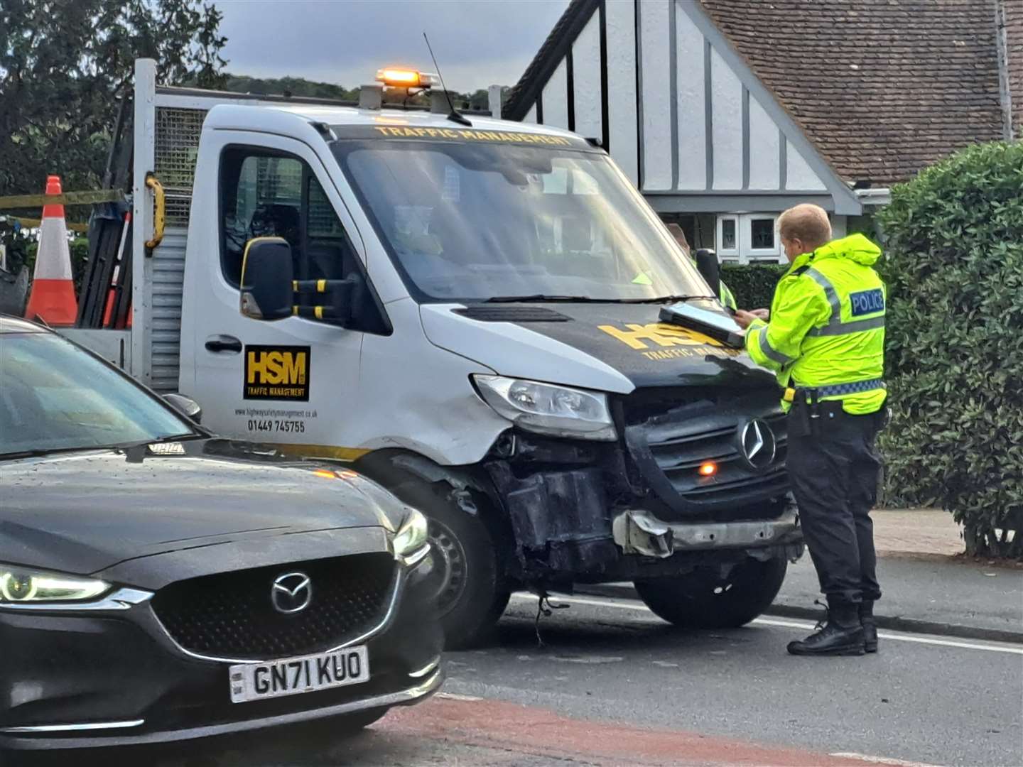 Officers have been seen examining a truck nearby