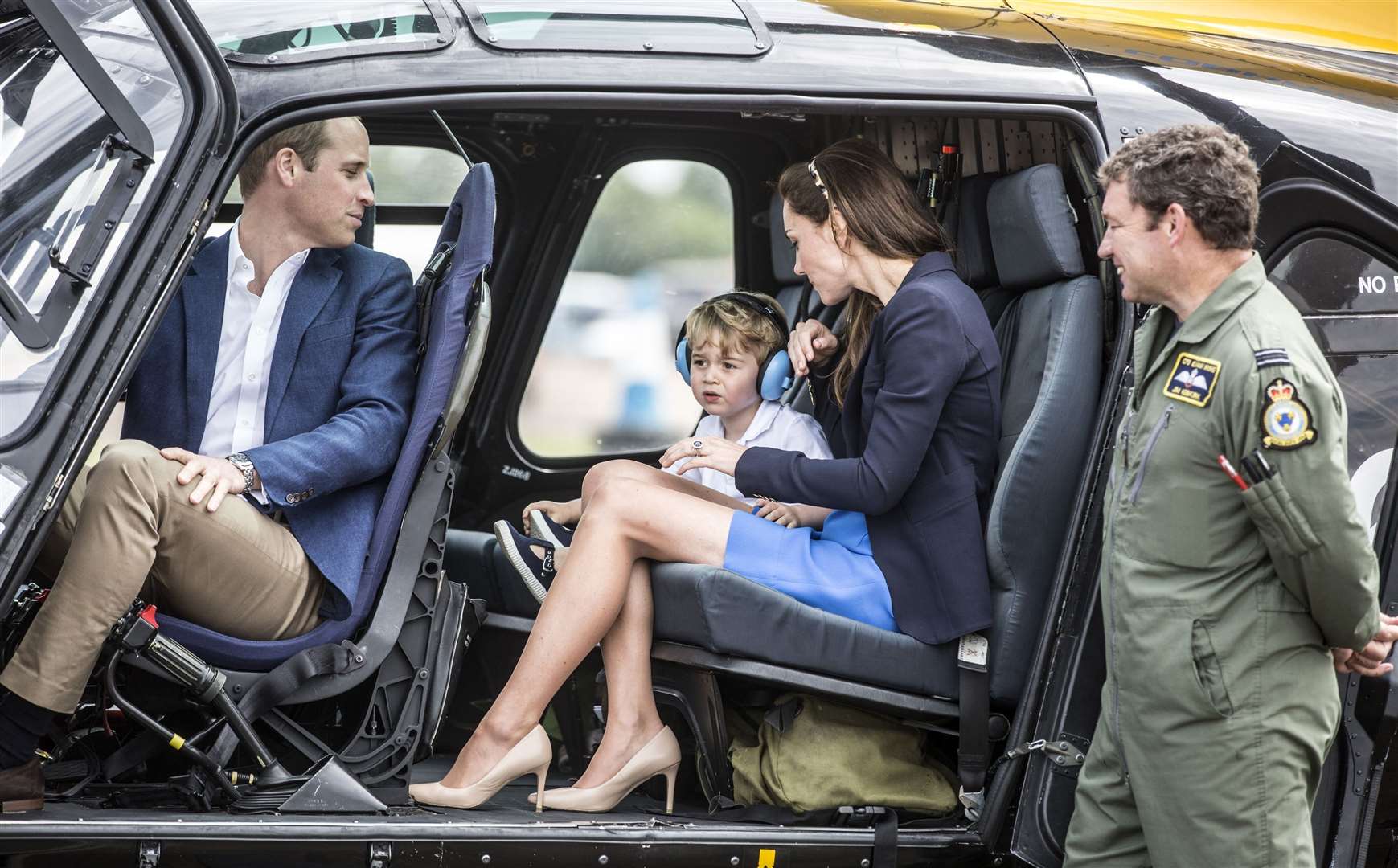 George got to sit in a Squirrel helicopter when the family visited the Royal International Air Tattoo at RAF Fairford (Richard Pohle/The Times/PA)