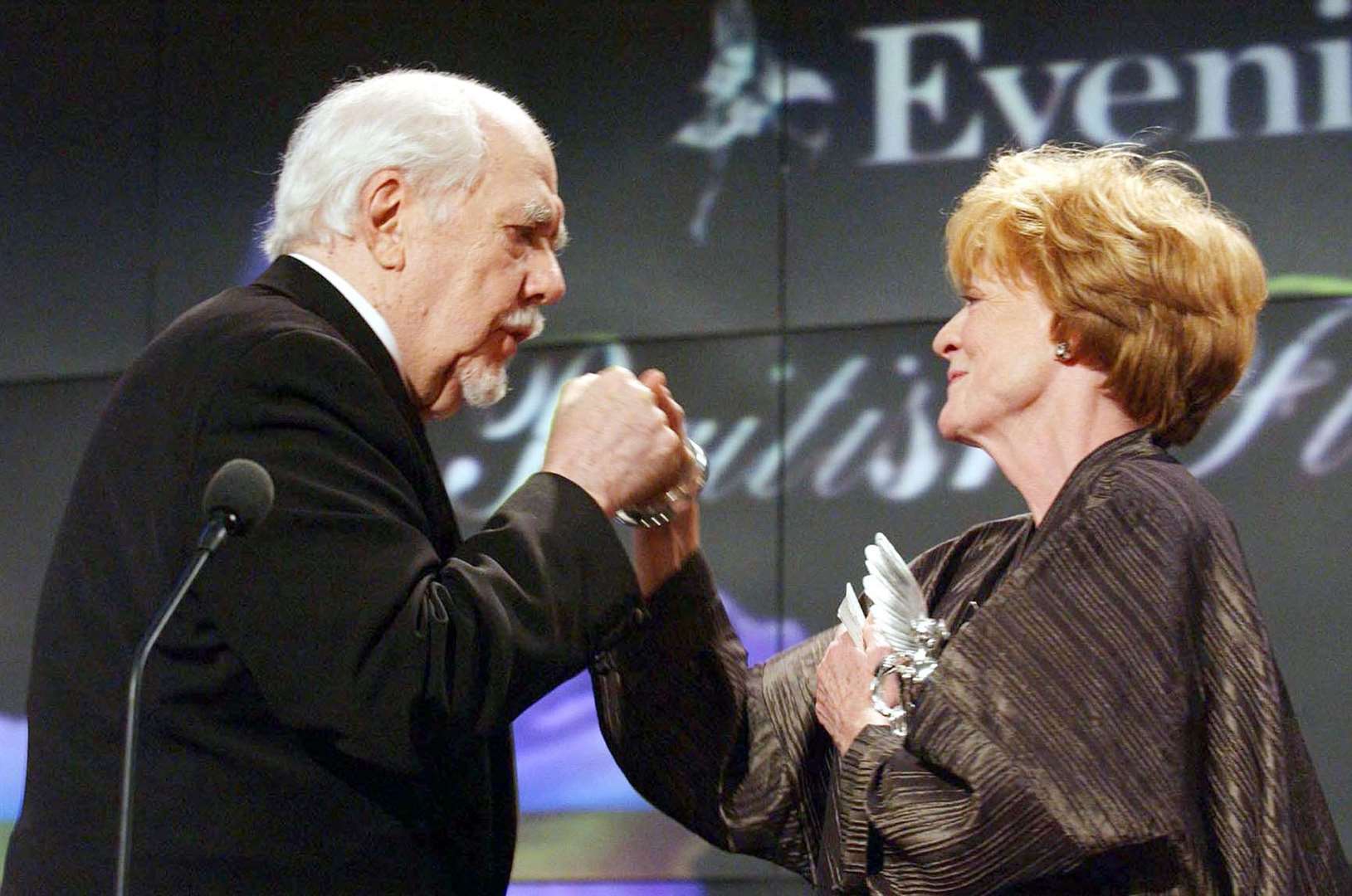 Robert Altman and Dame Maggie Smith with her award during the Evening Standard Film Awards 2002 at The Savoy in London (Yui Mok/PA)