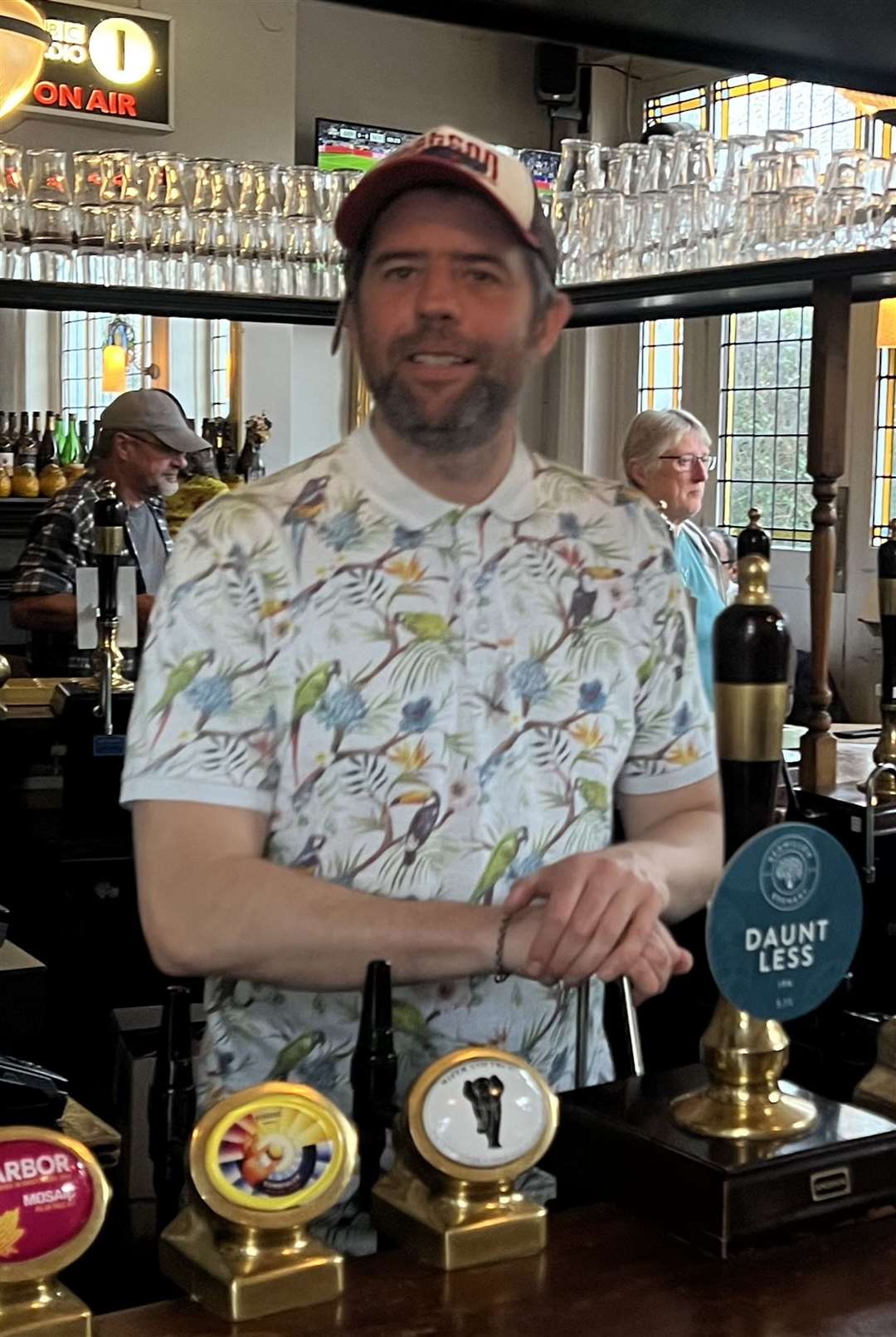 Chris French behind the bar of The Mitre (Chris French/PA)