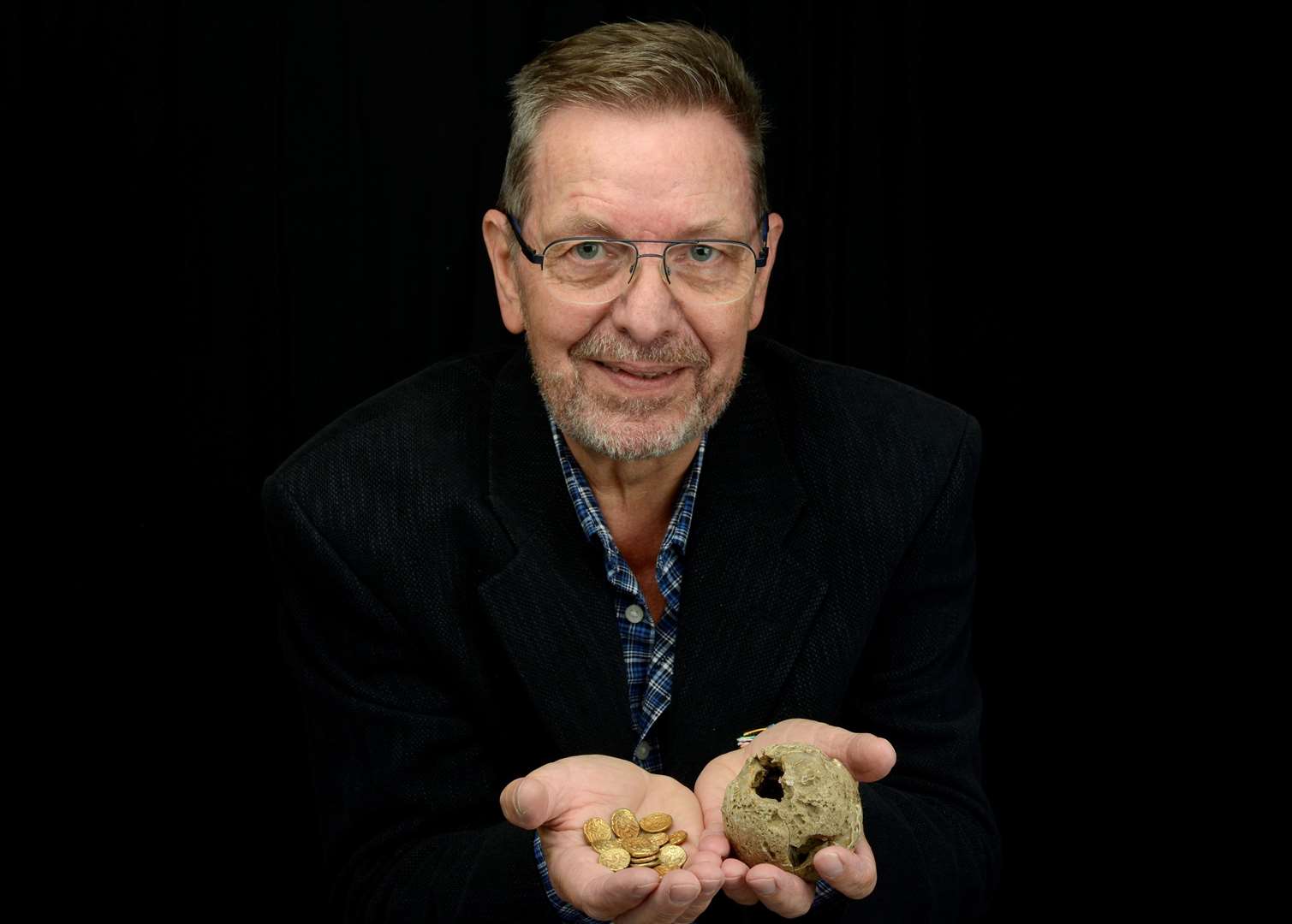 Metal detectorist Tony Asquith found the hoard of Roman coins sold alongside a flint nodule for more than £100,000. Picture: Tony Asquith