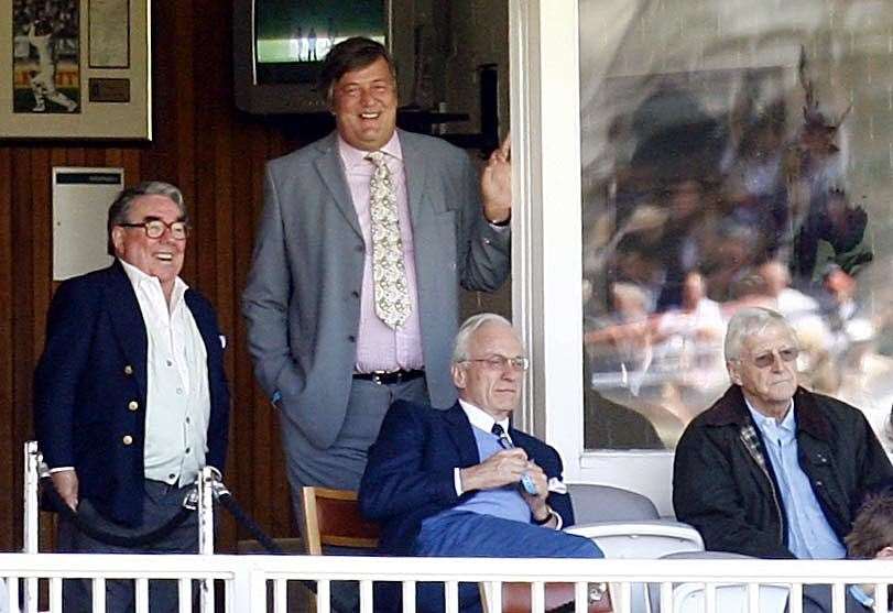 Watching cricket with Ronnie Corbitt and Stephen Fry at Lord’s in 2008 (PA)