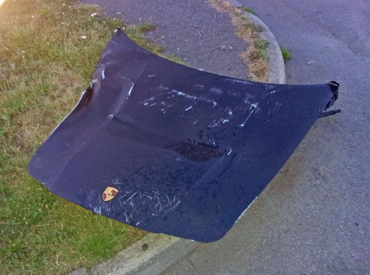 The bonnet of the damaged sports car