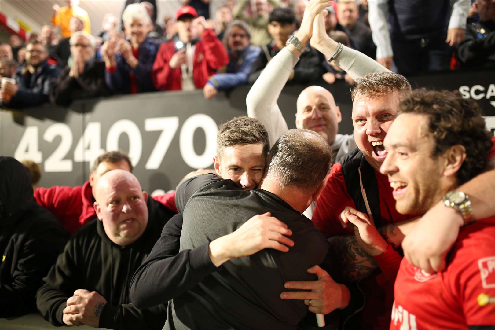 Chatham Town celebrate their play-off semi-final win over Horsham with home supporters Picture: Max English