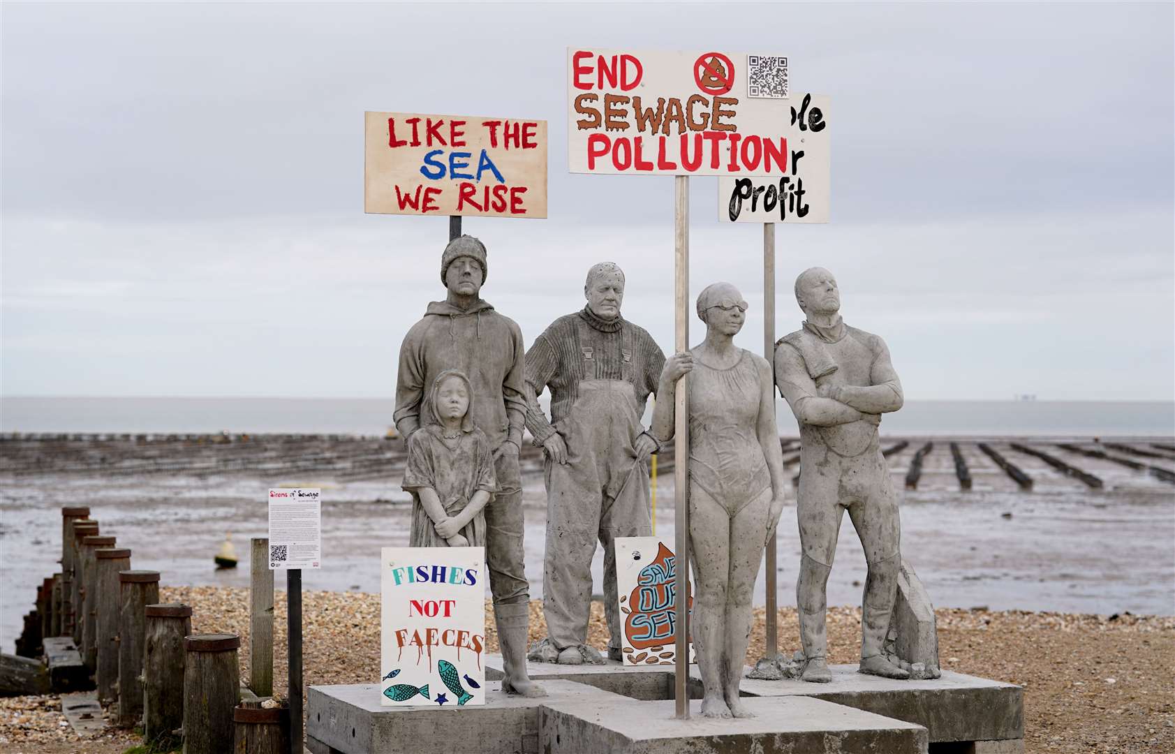 A view of art installation, Sirens of Sewage, by Jason DeCaires Taylor unveiled on the beach in Whitstable, Kent (Gareth Fuller/PA)