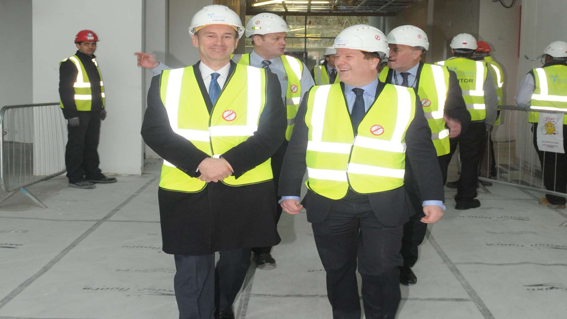 Health Secretary Jeremy Hunt (middle left) and MP Charlie Elphicke (middle right) visiting the new Buckland Hospital