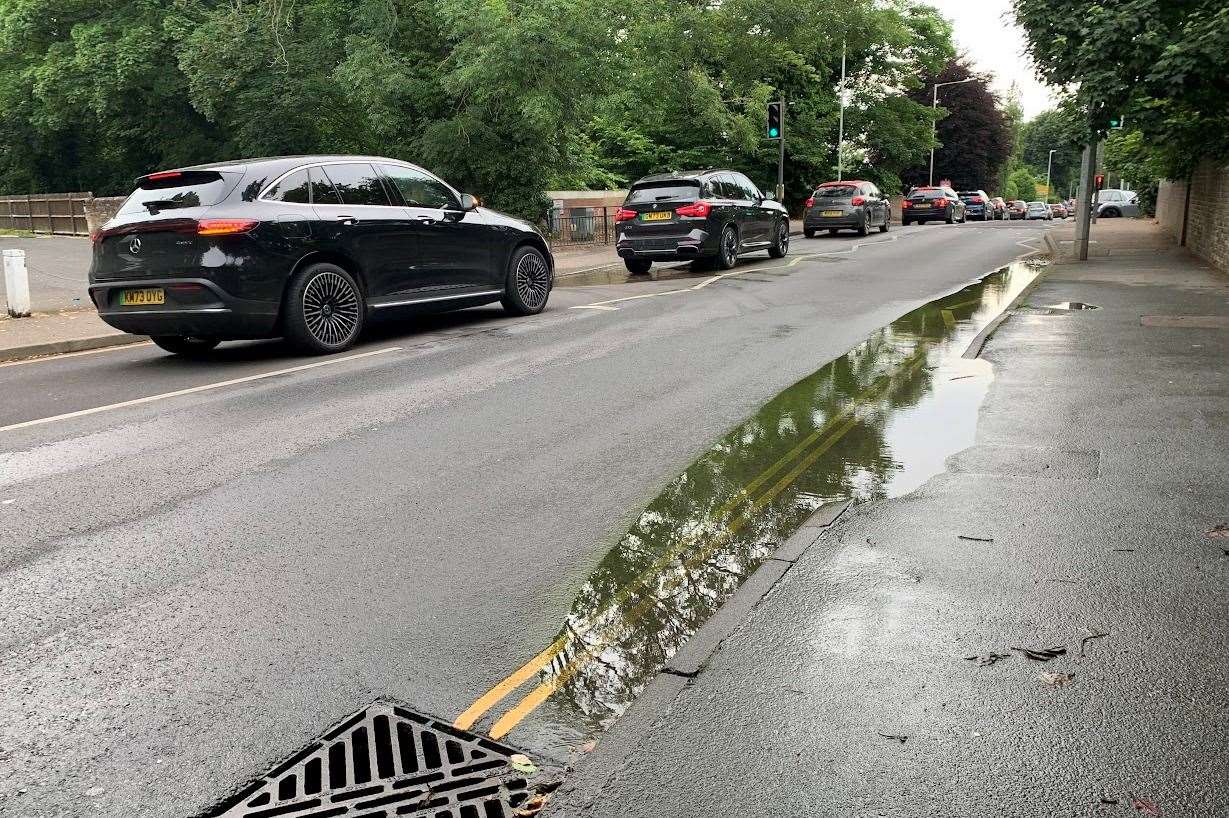 She added the huge puddle created impedes pedestrians using the pavement as they get splashed when cars drive through it