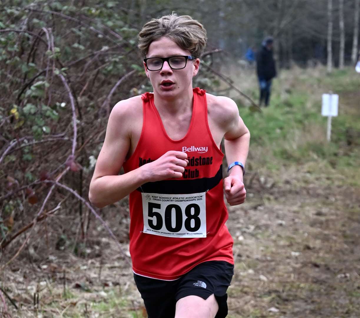 Louie Gear (No.508) flies the flag for Swale in the intermediate boys’ race. Picture: Simon Hildrew