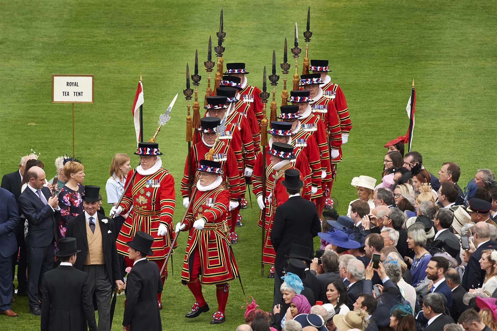 Yeomen of the Guard march at a garden party (Niklas Halle’n/PA)