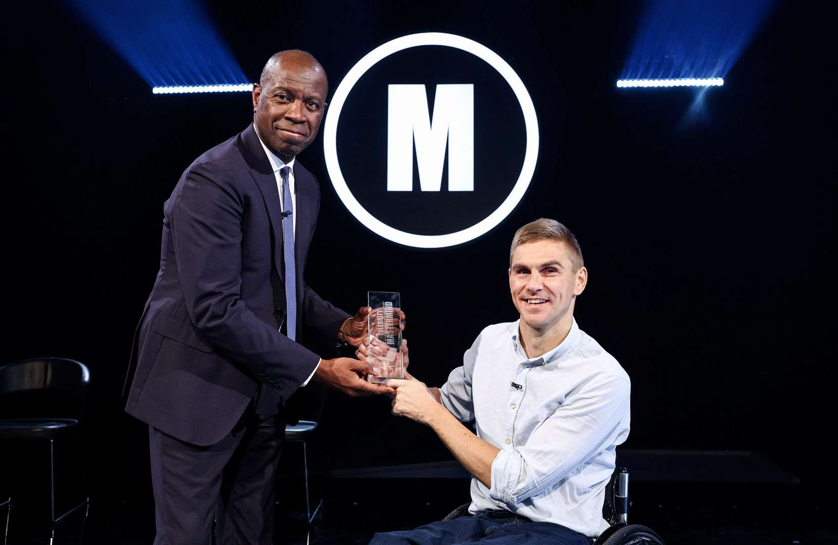 Steve Brown being presented with the Mastermind trophy by host Clive Myrie. Picture: BBC/Hindsight/Hat Trick Productions/William Cherry/Press Eye