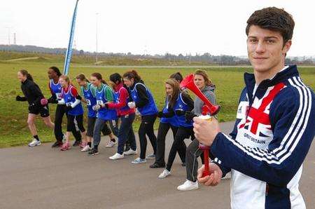 British Decathlon athlete David Hall starts the girls race