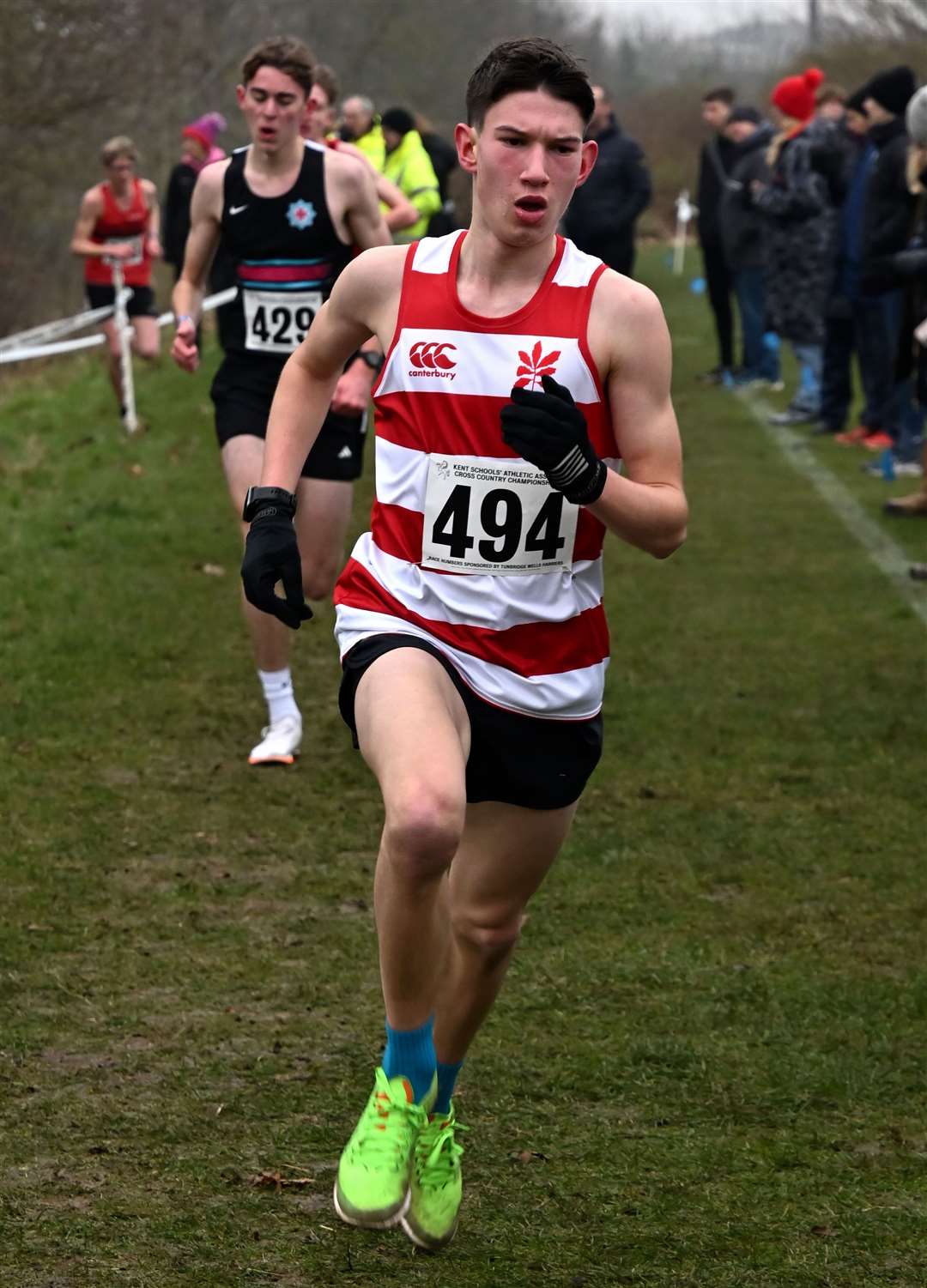 Sevenoaks’ Ben Catchpole (No.494) battles for position in the intermediate boys’ race. Picture: Simon Hildrew