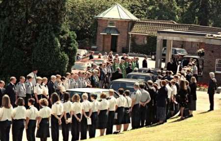 Ambulance men and women line the route for the funeral of Tony Richardson in 1998