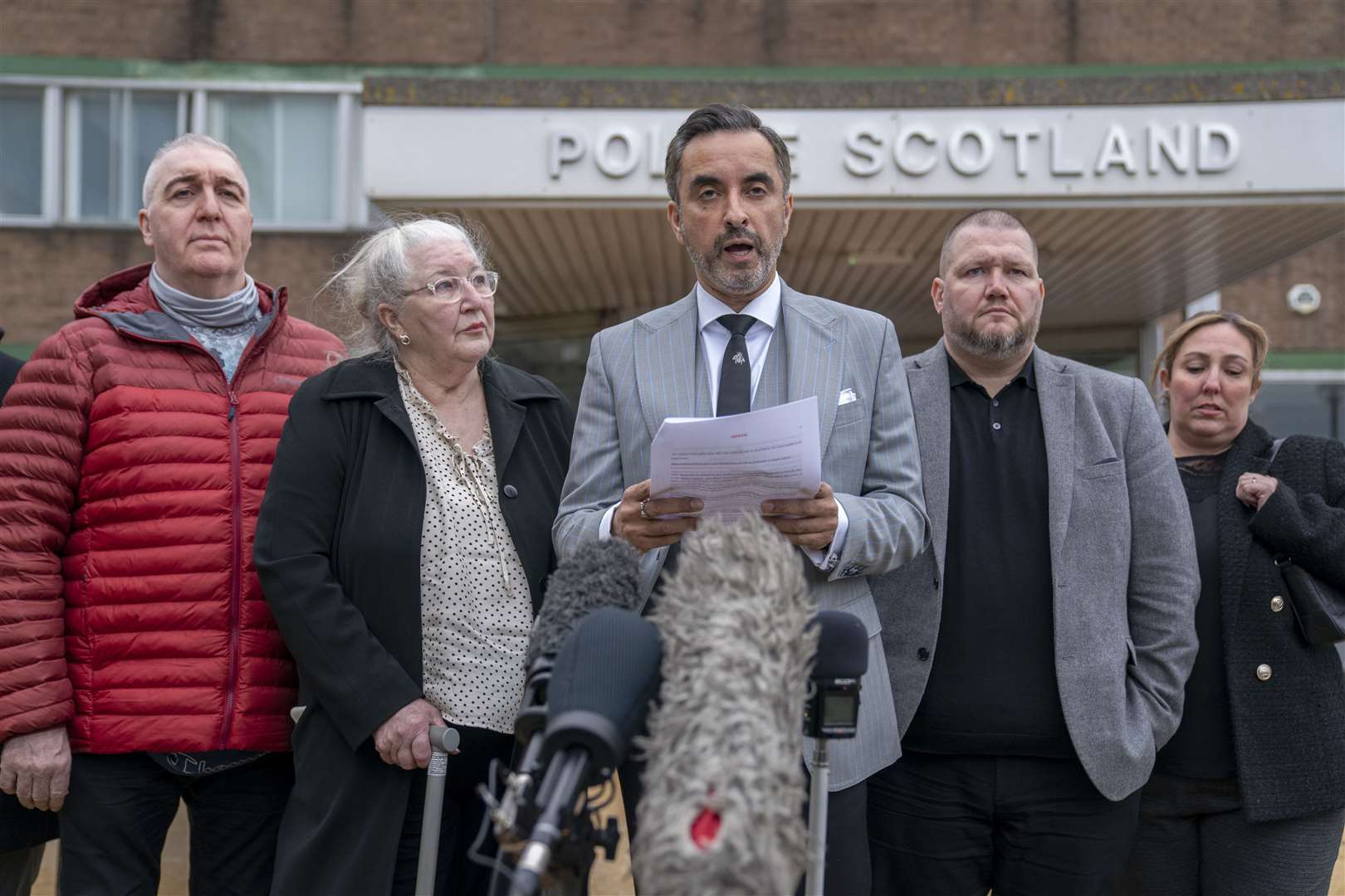 Lawyer Aamer Anwar delivers a statement, alongside Margaret Caldwell, left (Jane Barlow/PA)