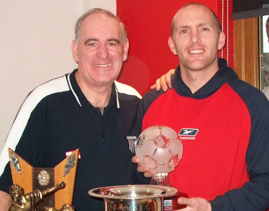 Alan pictured with Paul Smith after presenting the player with his GISC player-of-the-year trophies inr 2005