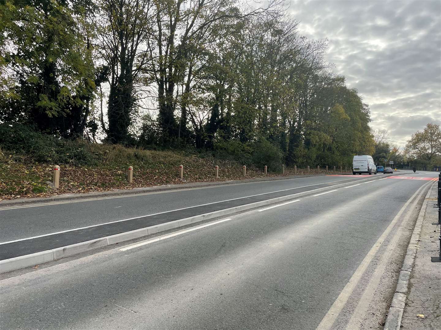 The traffic island has narrowed the carriageway by a metre