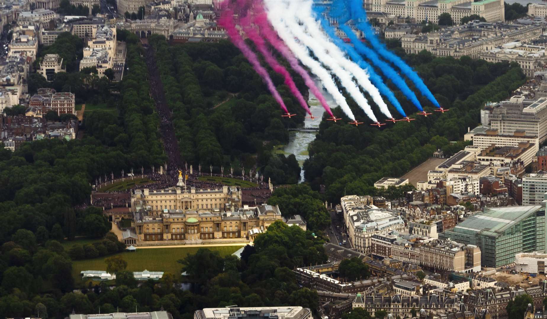 The RAF Red Arrows perform a flypast over Buckingham Palace (Chris Ison/PA)