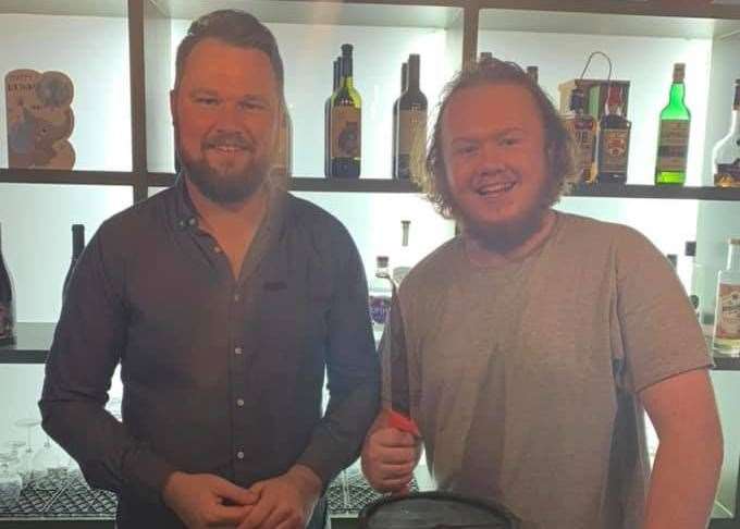 Brothers John Beerling and Max Bell (right) behind the bar. Picture: Max Bell