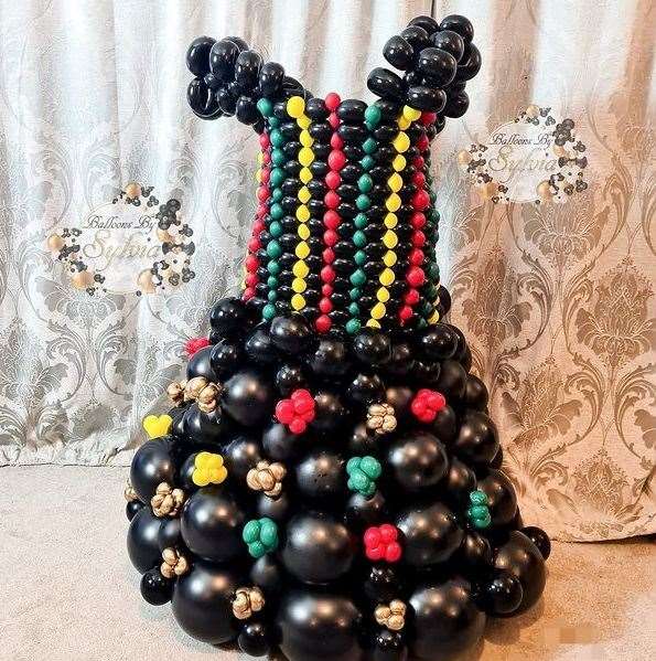 Balloon artist Sylvia Udomhiaye created a quirky dress to mark Black History Month. Photo: Sylvia Udomhiaye