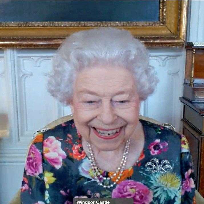 The Queen appears on a screen via videolink from Windsor Castle during a virtual audience to receive David Constantine and present him with The Queen’s Gold Medal for Poetry, at Buckingham Palace (Buckingham Palace/PA)