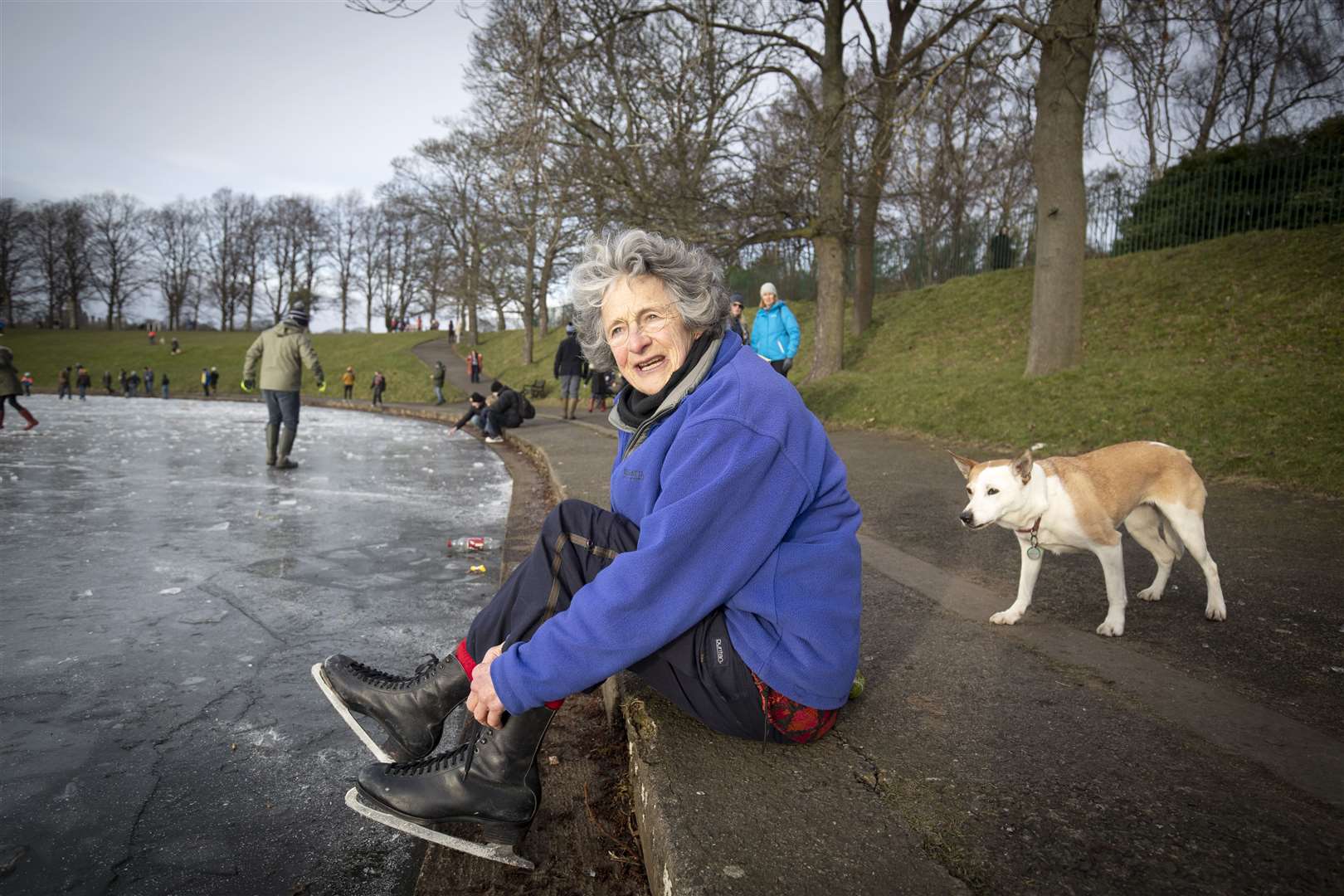 Jenny Cook prepares to skate on the frozen pond in Edinburgh (Jane Barlow/PA)