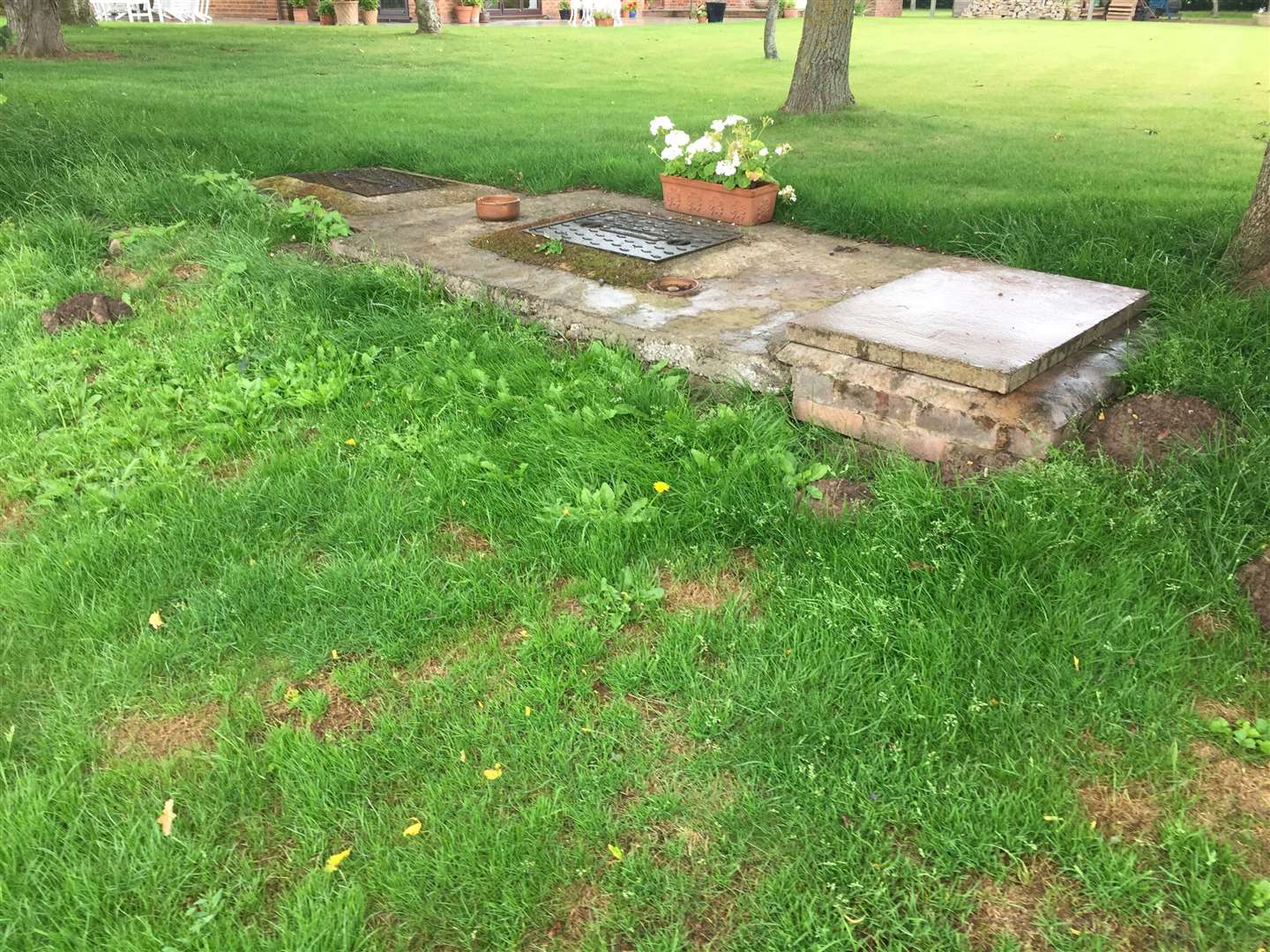 The cover of the septic tank at a house in Bestmans Lane, Kempsey, where Ms Venables’ remains were recovered. (Richard Vernalls/PA)