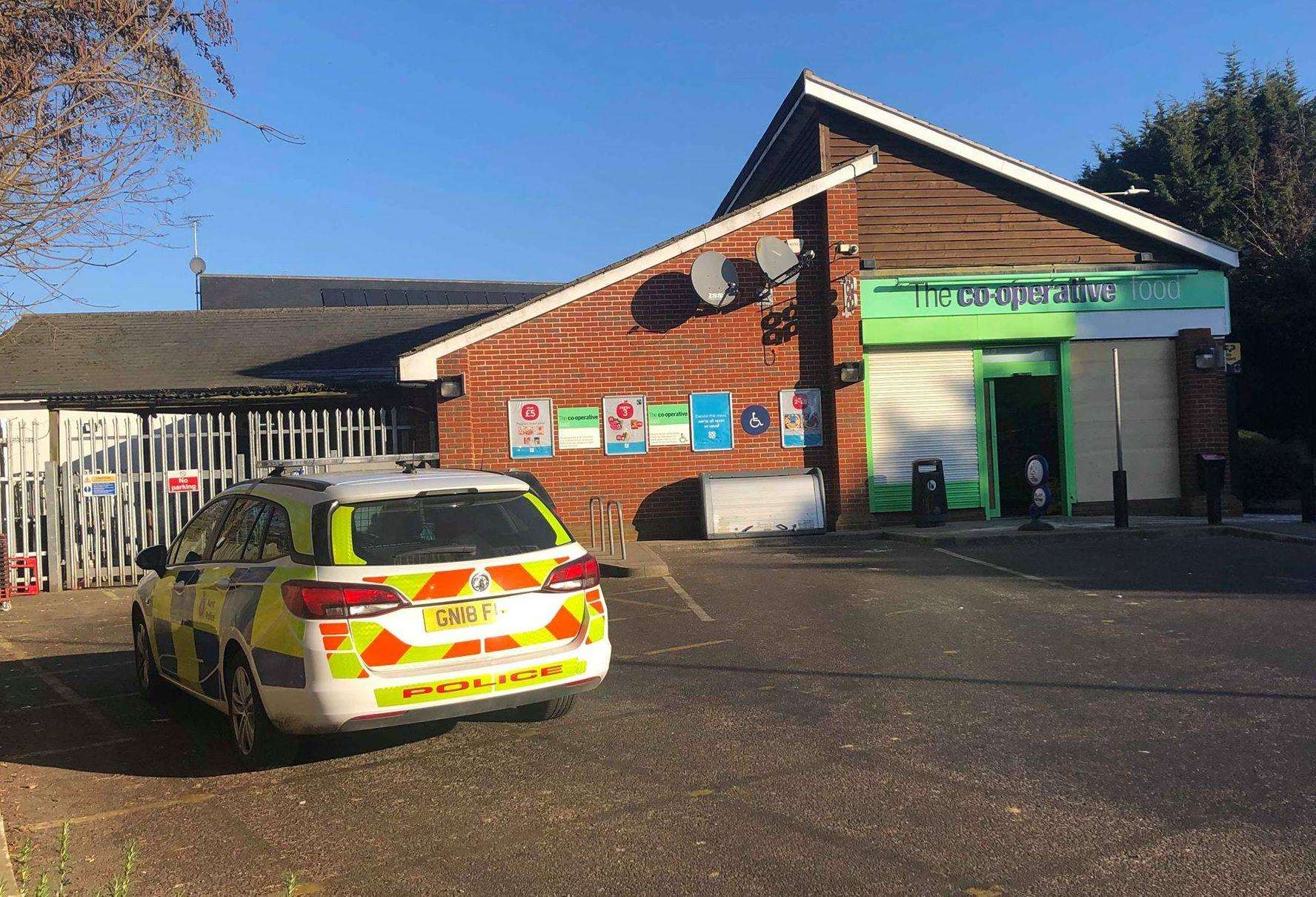 Police outside the Co-op this morning