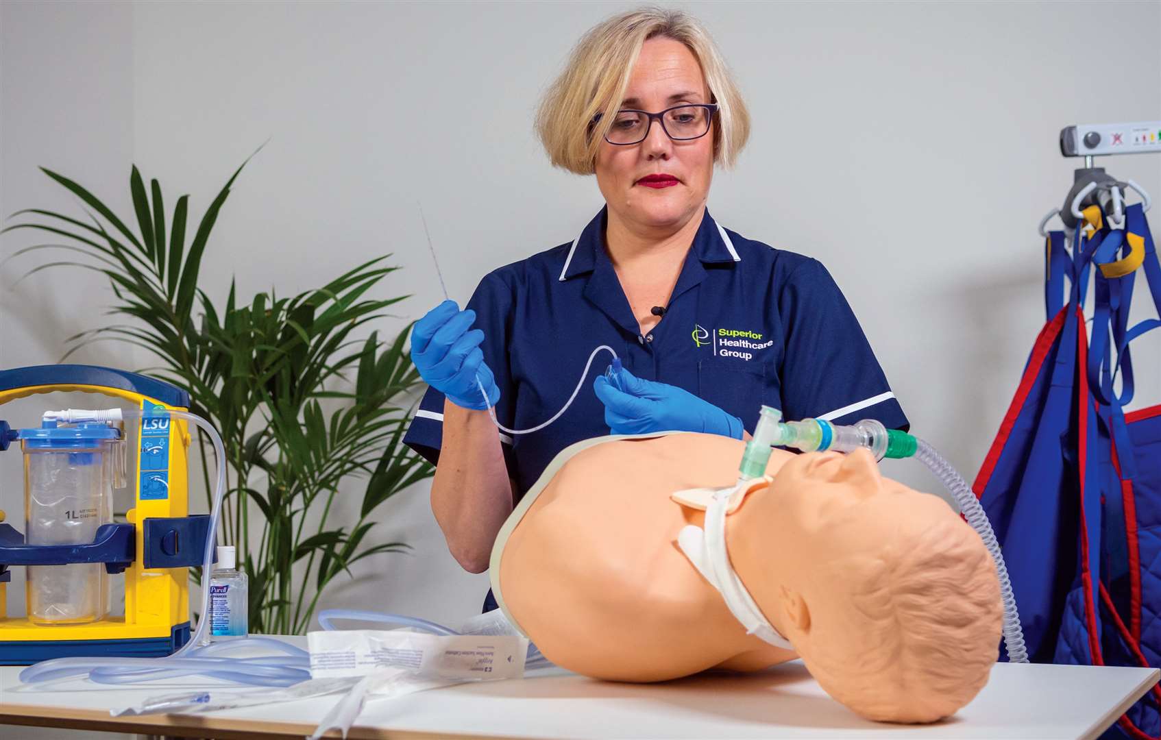 A Superior Healthcare nurse manager delivering training and development to her care team